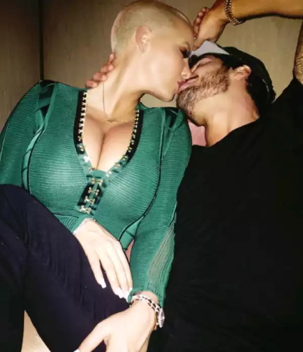 Amber Rose and her boo Val Chmerkovskiy share a kiss